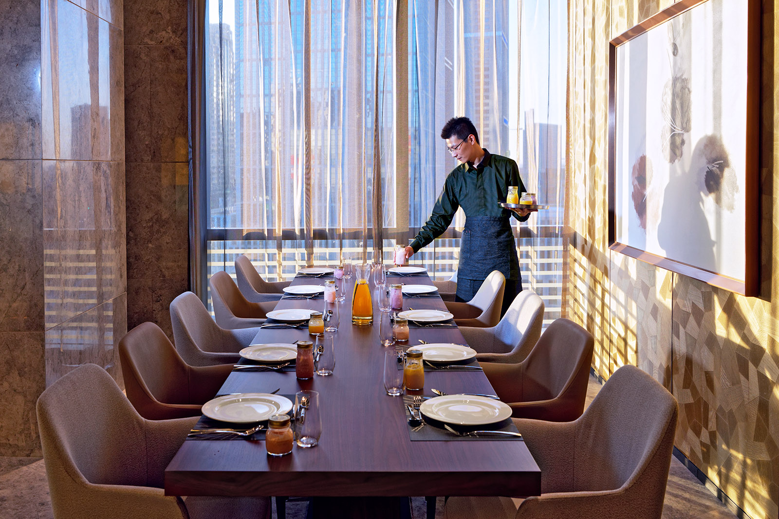 Interior, exterior, and aerial drone architectural photography of the Fraser Suites in Dalian, China. Paul Dingman is an architectural photographer based in Asia and China and specializing in the photography of hotels and resorts.