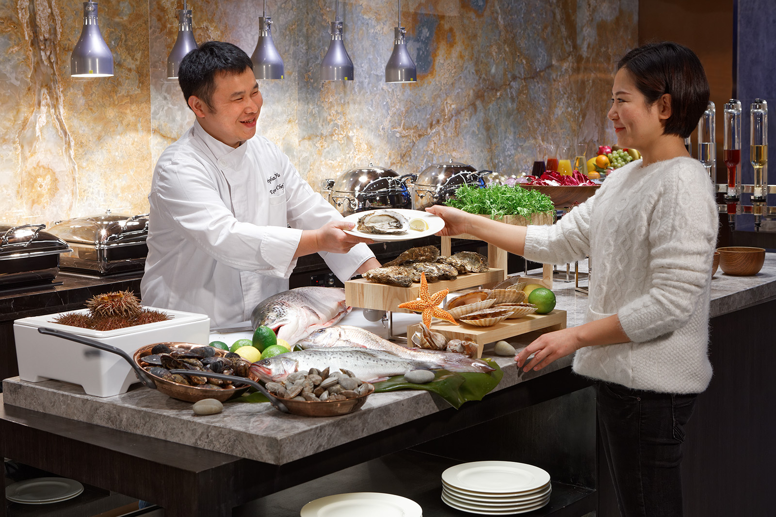 Interior, exterior, and aerial drone architectural photography of the Fraser Suites in Dalian, China. Paul Dingman is an architectural photographer based in Asia and China and specializing in the photography of hotels and resorts.