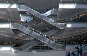 Architectural photography of the escalators at Hauqiao International Airport in Shanghai China. Paul Dingman is an architectural photographer based in China. He specializes in the photography of airports and transportation and large scale projects. He works throughout China and Asia.